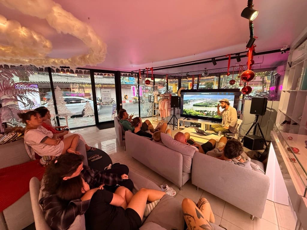 Group watching a presentation in the Library community space